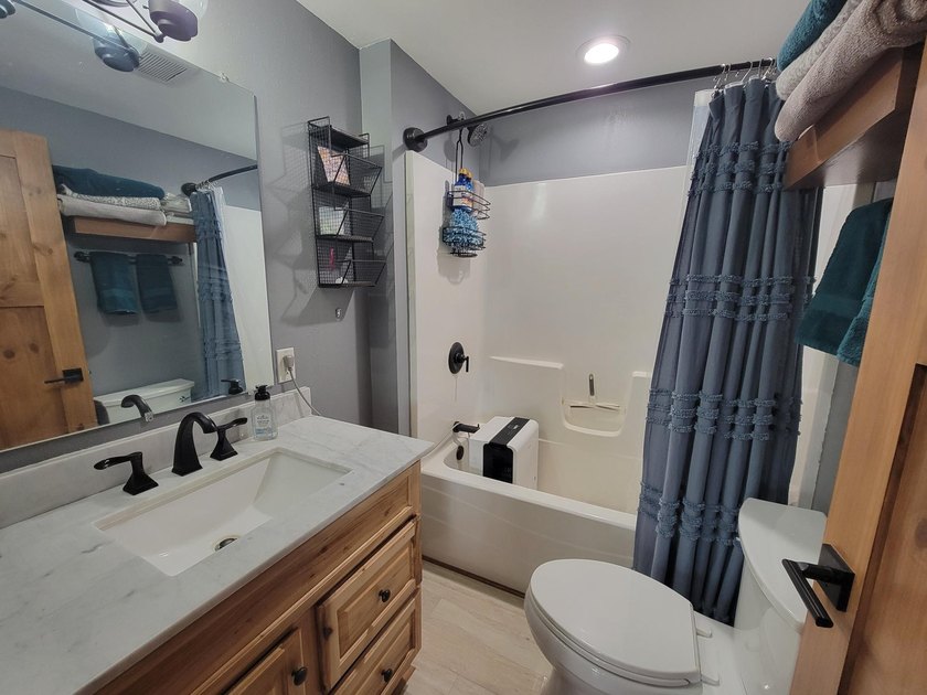 Updated 2-bedroom west-facing home with 264' of frontage on - photo 8