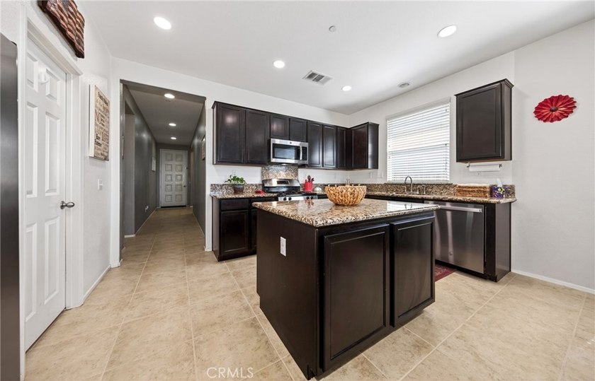 Welcome to this beautifully maintained home located in the gated - photo 10