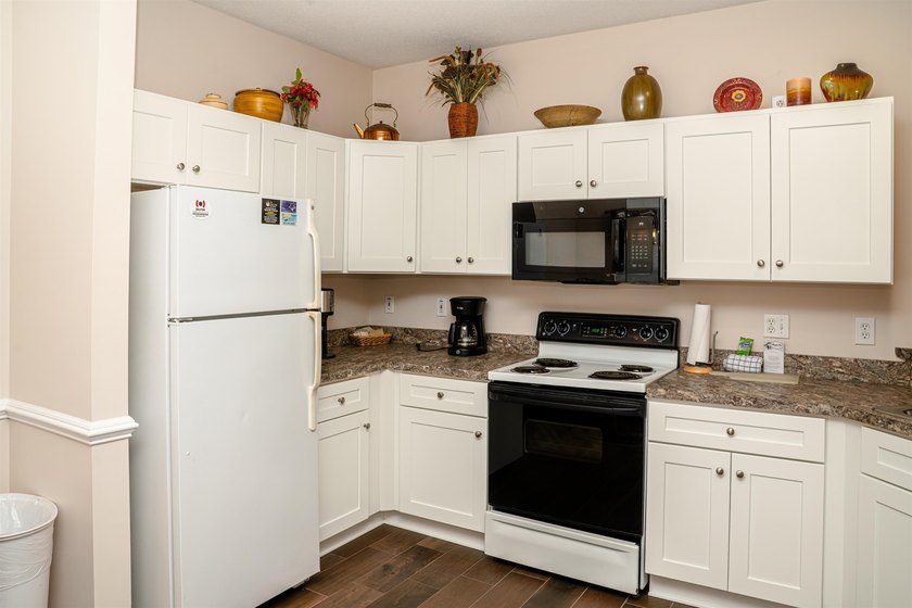 Welcome to your new 2 bed/2 bathroom condo located in the - photo 5