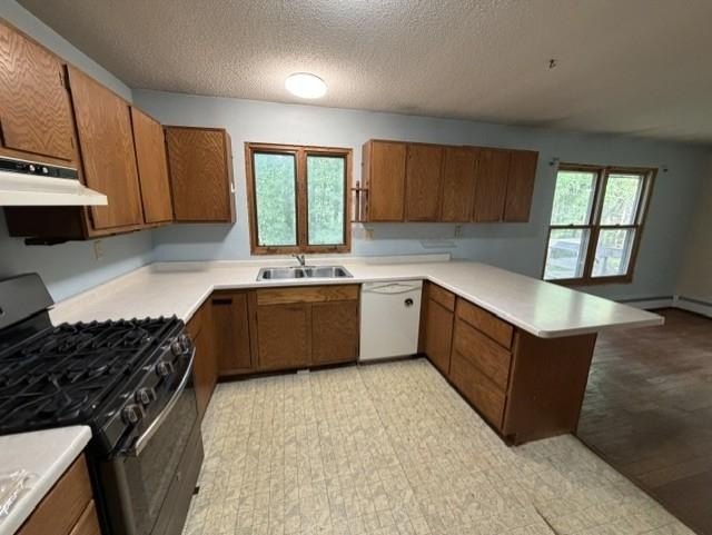 Tucked away on .68 wooded acres, this 2-bedroom 2-bath raised - photo 6