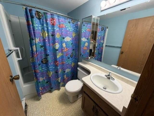 Tucked away on .68 wooded acres, this 2-bedroom 2-bath raised - photo 7