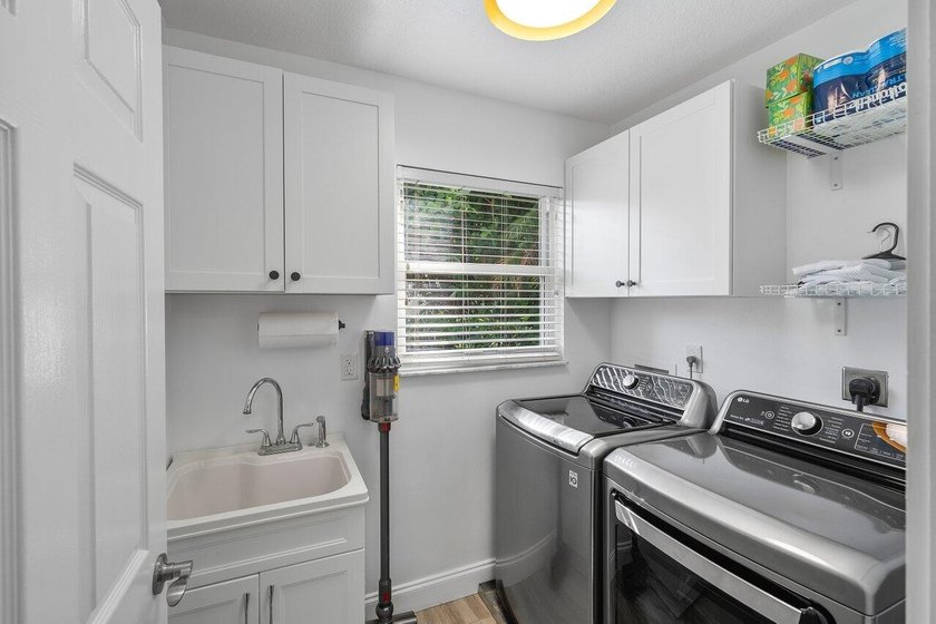 Stunning, fully renovated 4 BD, 2.5 BA residence situated on an - photo 19
