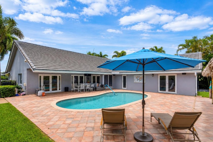 Stunning, fully renovated 4 BD, 2.5 BA residence situated on an - photo 24