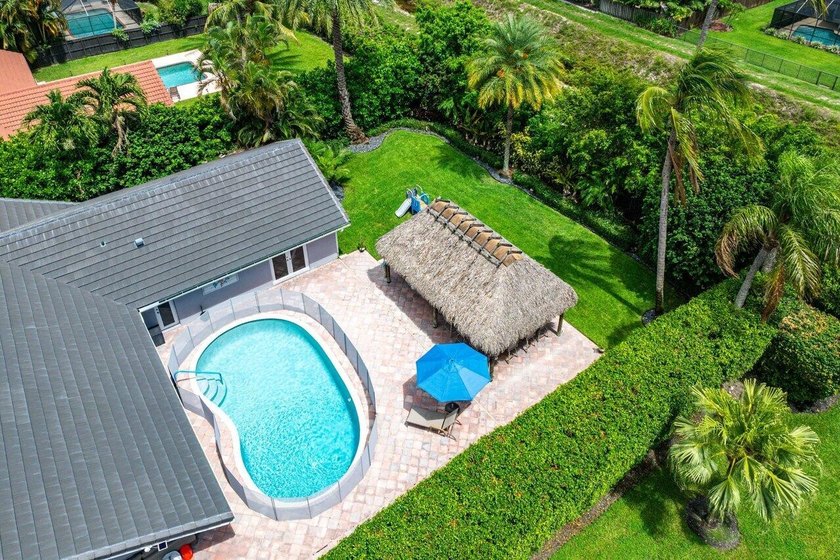 Stunning, fully renovated 4 BD, 2.5 BA residence situated on an - photo 27