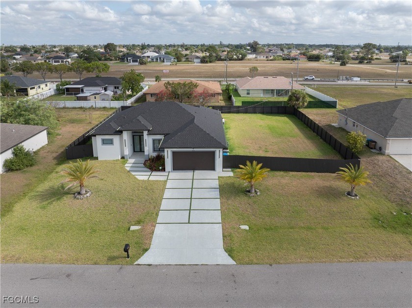 Discover refined Florida living in this exquisite 2024-built - photo 3