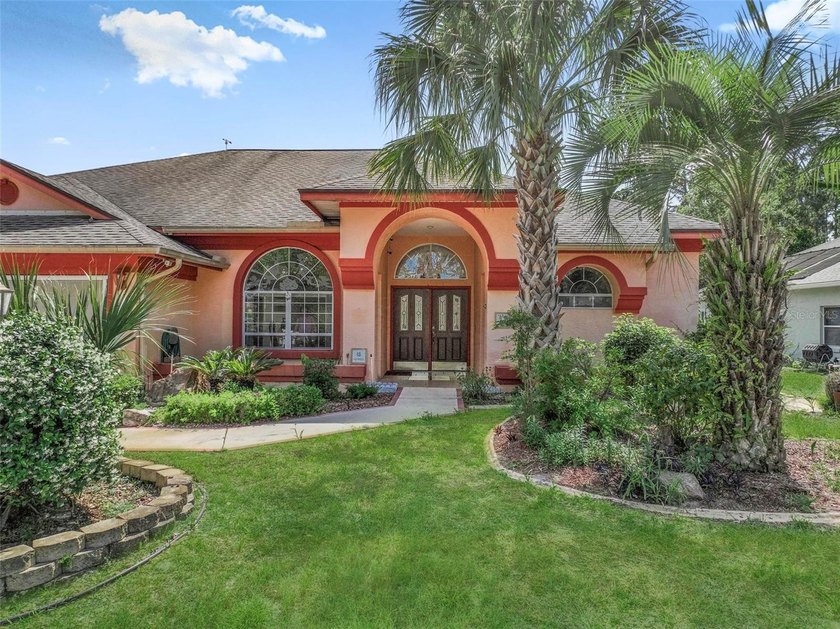 Spacious custom pool home situated on an oversized lot in the - photo 2