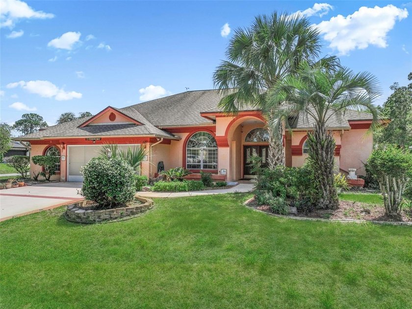 Spacious custom pool home situated on an oversized lot in the - photo 3