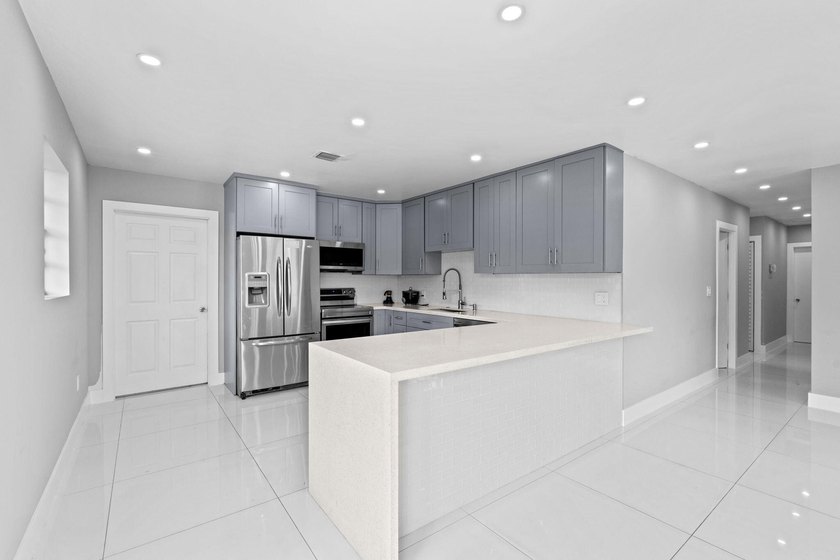 Discover this beautifully maintained 4-bedroom, 2-bathroom - photo 10