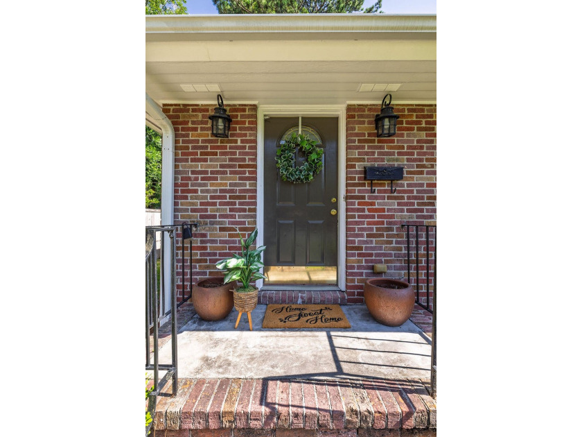 Welcome to 1056 Keats Road, a charming brick home nestled in the - photo 7