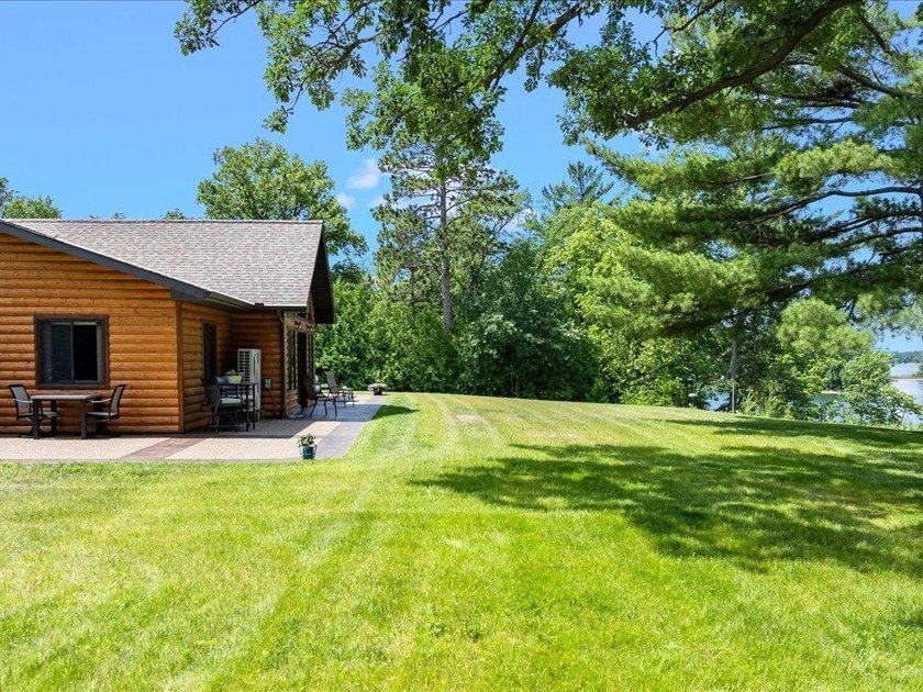 LAKE BELLE TAINE! Rare offering alert on one of the region's - photo 13