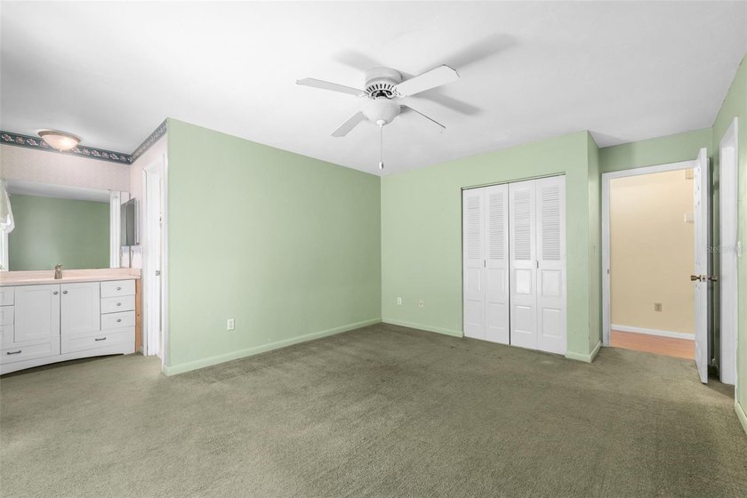 Welcome to your new home! Nestled on a spacious half-acre lot in - photo 17