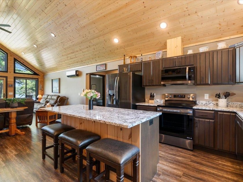 LAKE BELLE TAINE! Rare offering alert on one of the region's - photo 22