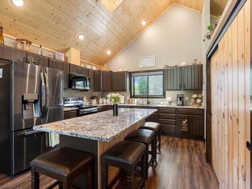 LAKE BELLE TAINE! Rare offering alert on one of the region's - photo 24