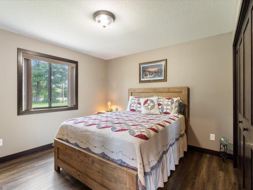 LAKE BELLE TAINE! Rare offering alert on one of the region's - photo 31