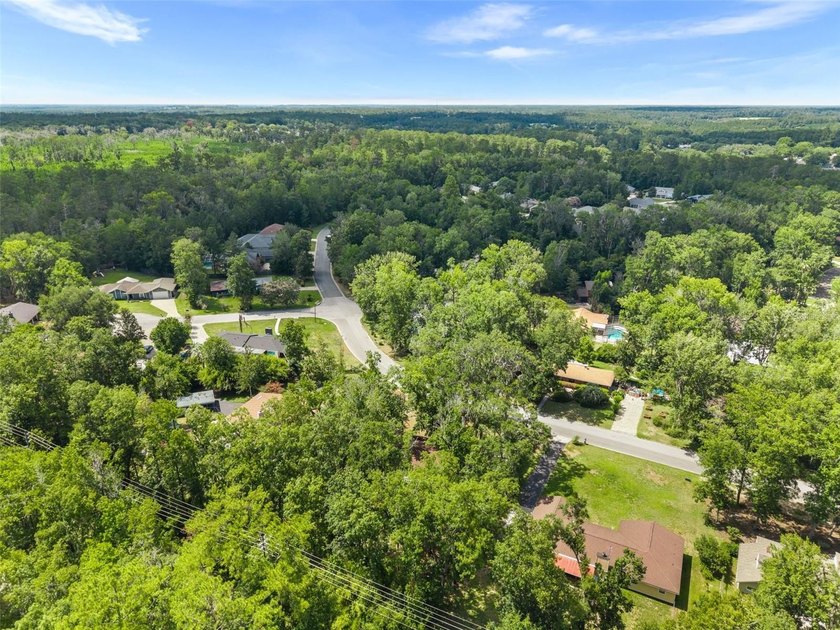 Welcome to your new home! Nestled on a spacious half-acre lot in - photo 32