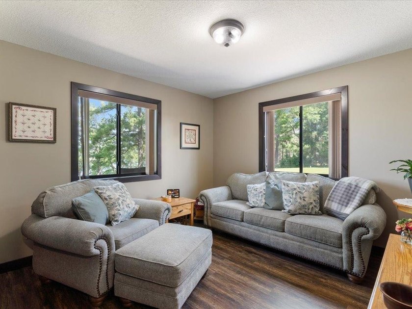 LAKE BELLE TAINE! Rare offering alert on one of the region's - photo 33