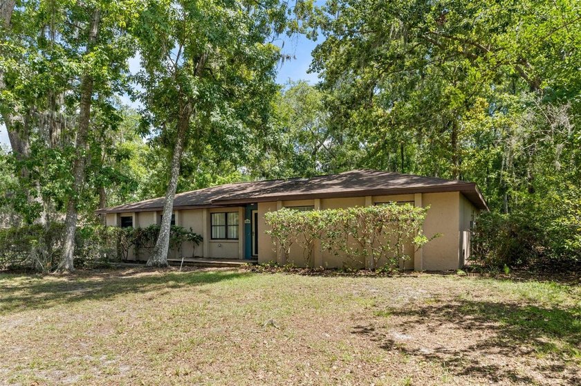 Welcome to your new home! Nestled on a spacious half-acre lot in - photo 39