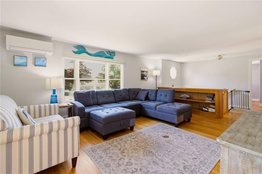 Tucked away on a quiet street and backing directly onto the open - photo 4