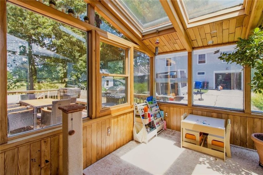Tucked away on a quiet street and backing directly onto the open - photo 6