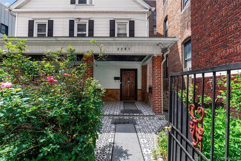 Welcome to 2281 Loring Place North, a spacious two-family home - photo 3