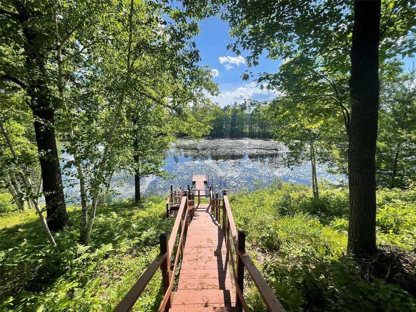 Experience Northwoods lake living at its finest in this - photo 13