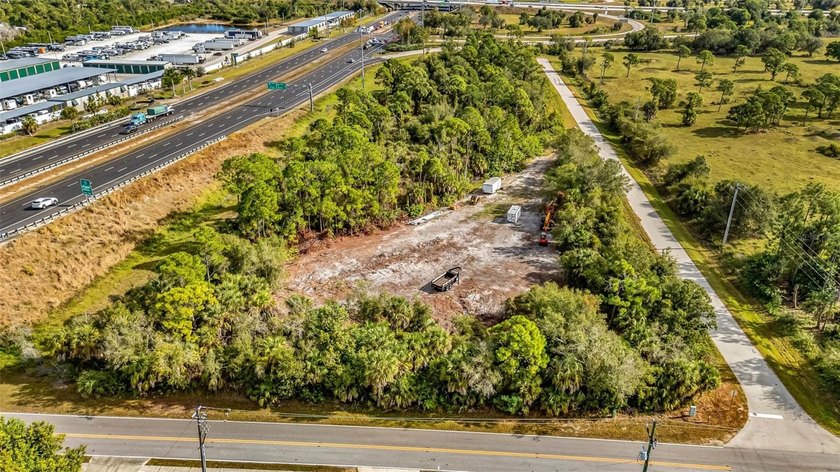 This commercial lot offers excellent visibility and a strong - photo 8