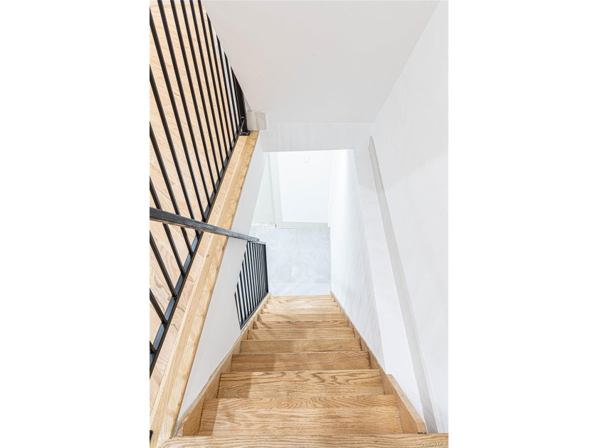 This lovely 2-family home was gut renovated in 2020 and includes - photo 11