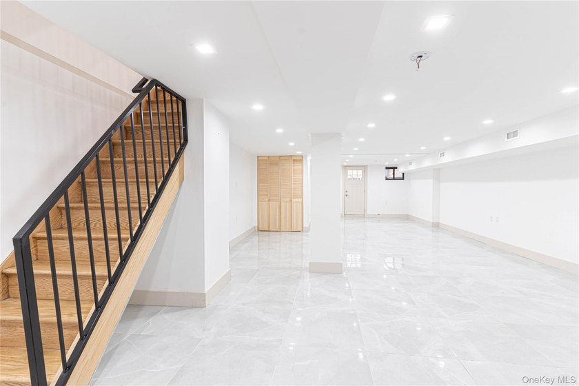 This lovely 2-family home was gut renovated in 2020 and includes - photo 13