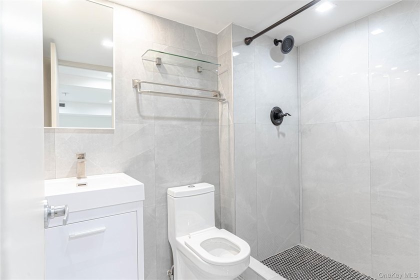 This lovely 2-family home was gut renovated in 2020 and includes - photo 15