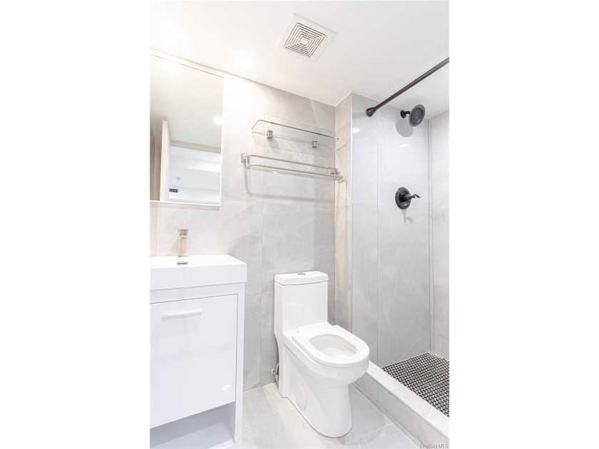 This lovely 2-family home was gut renovated in 2020 and includes - photo 16