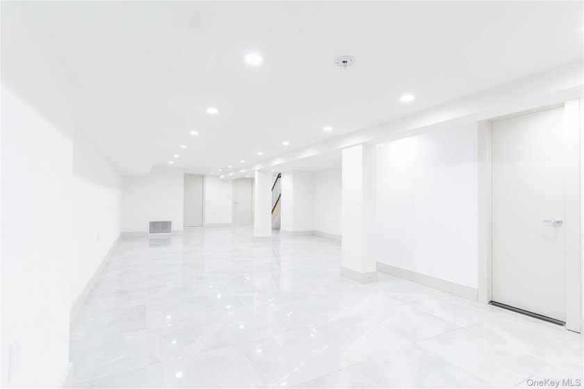 This lovely 2-family home was gut renovated in 2020 and includes - photo 18
