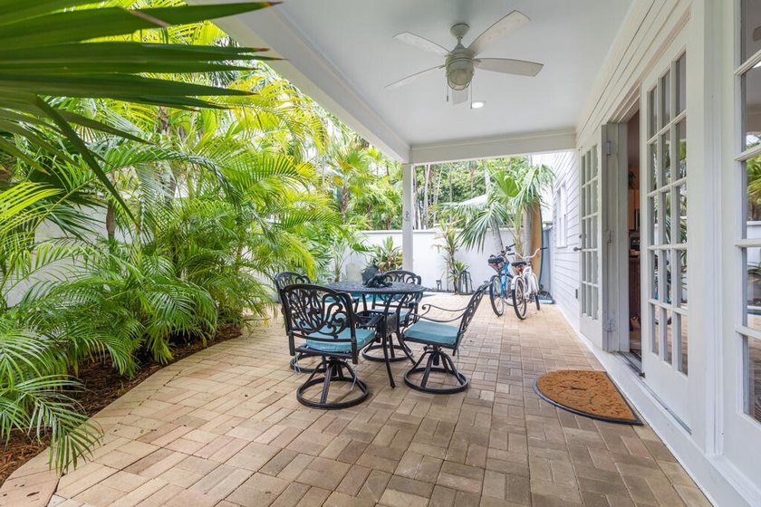 Beautifully appointed home that offers a charming backyard with - photo 9