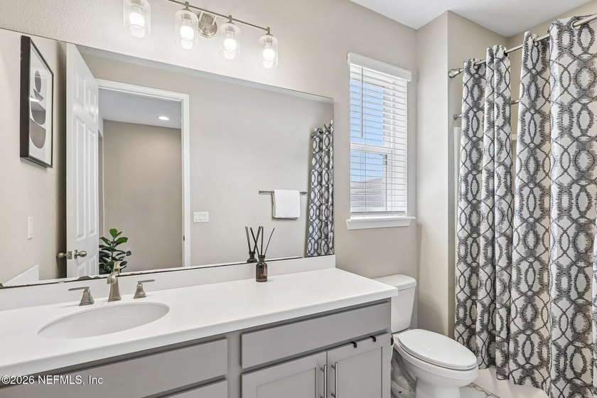 Step into a home that effortlessly blends modern comfort with - photo 22
