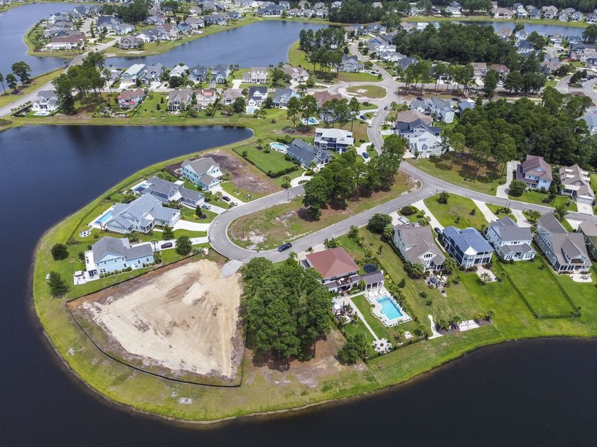 Build on your own schedule with this 0.25-acre lakefront - photo 10