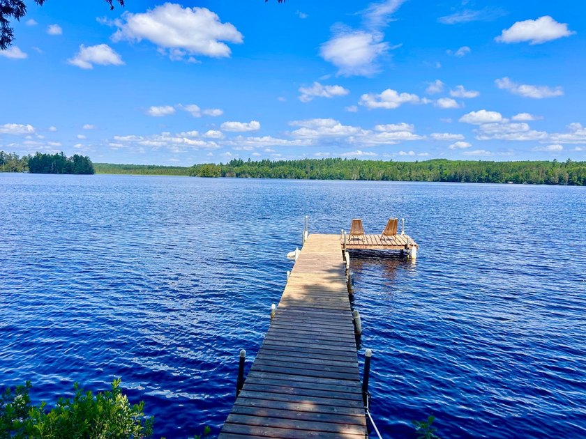 STUNNING FOUR MILE LAKE CHALET! Experience the best of - photo 2