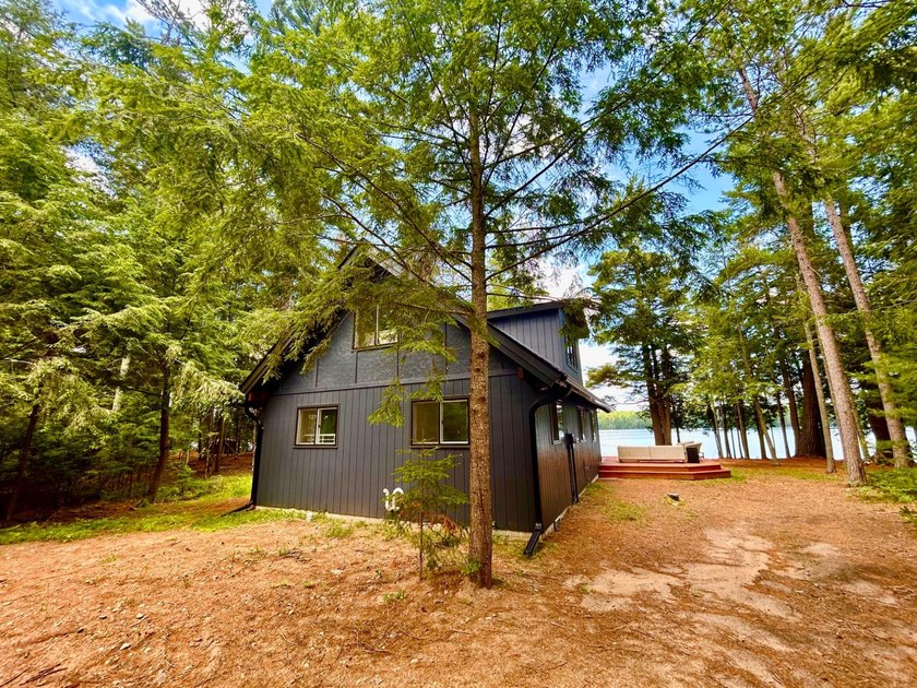 STUNNING FOUR MILE LAKE CHALET! Experience the best of - photo 5