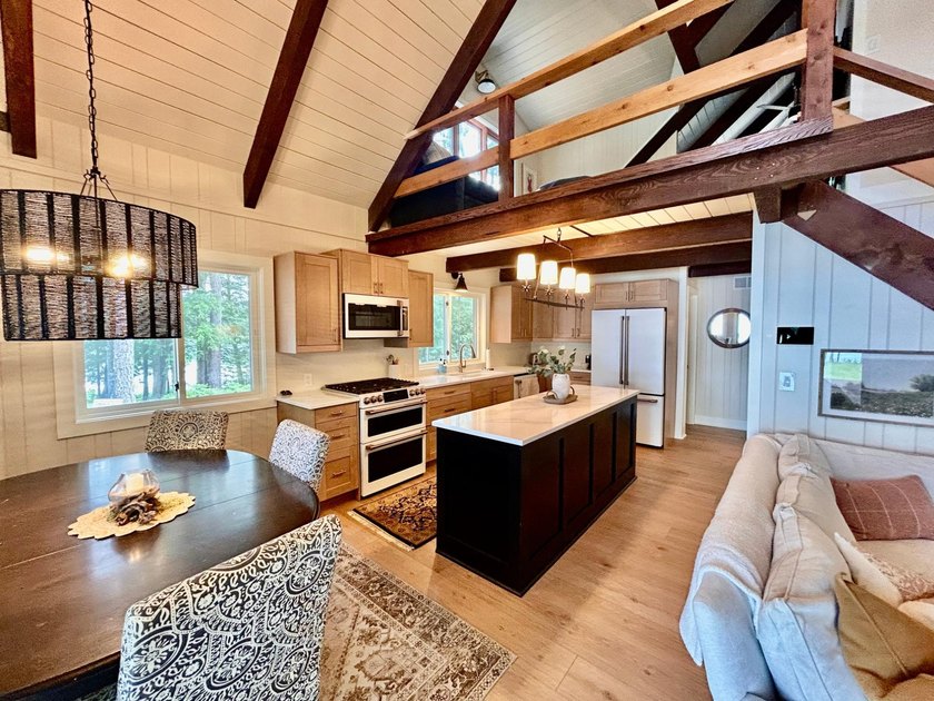 STUNNING FOUR MILE LAKE CHALET! Experience the best of - photo 9