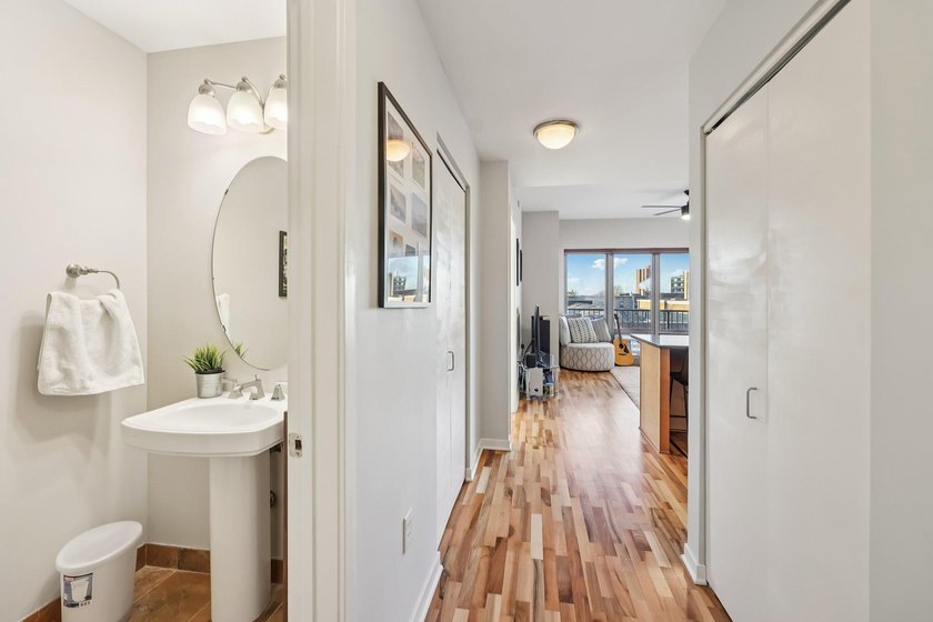 This Skyscape single-level end-unit condo offers the privacy and - photo 12