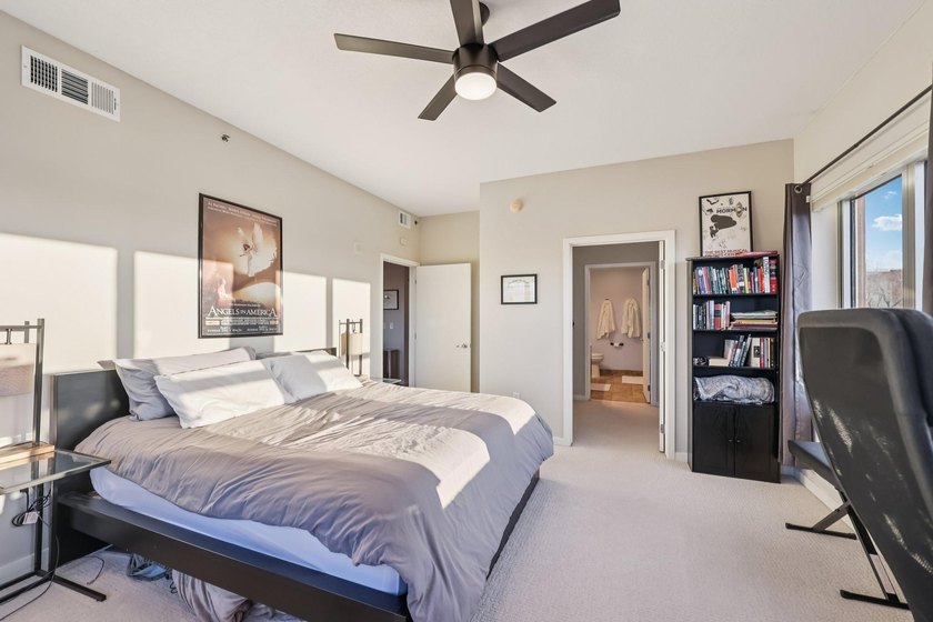 This Skyscape single-level end-unit condo offers the privacy and - photo 17