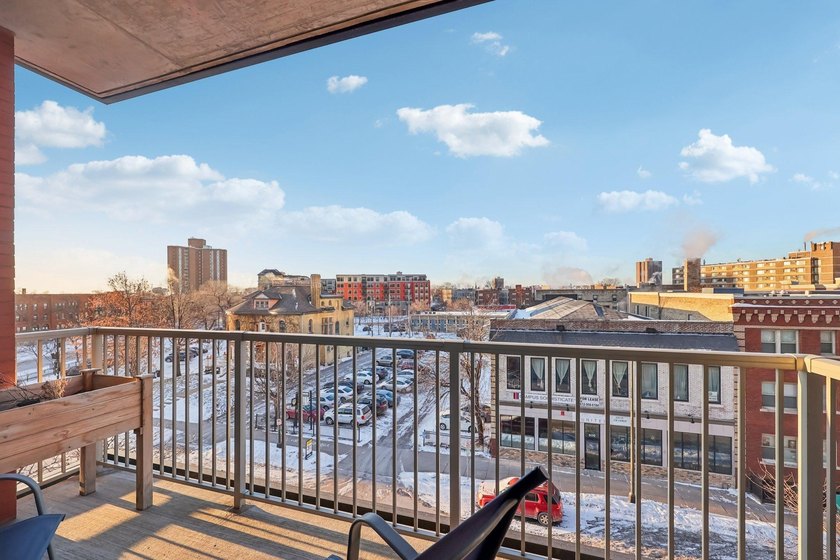 This Skyscape single-level end-unit condo offers the privacy and - photo 24