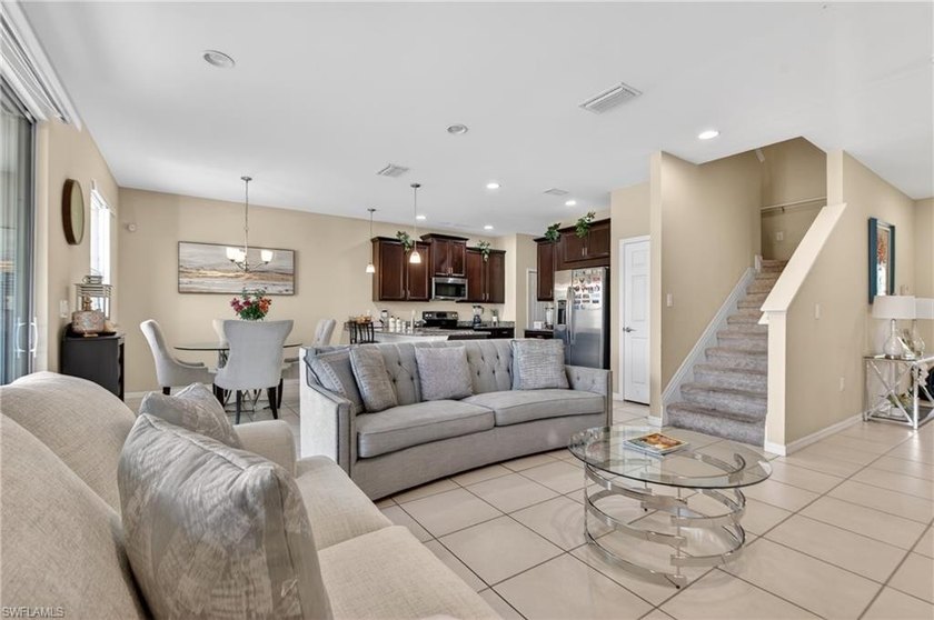 Discover contemporary townhome living in Cordera, a gated - photo 3