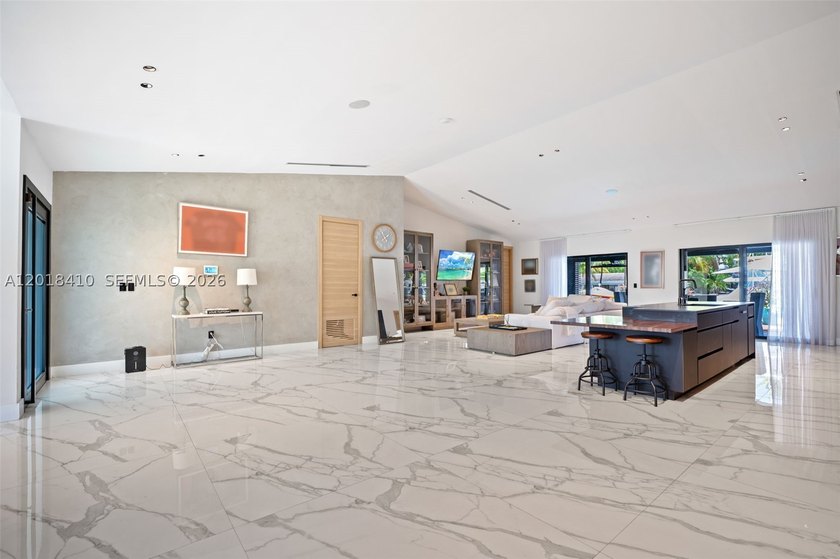 Step into this meticulously renovated residence in the Western - photo 3