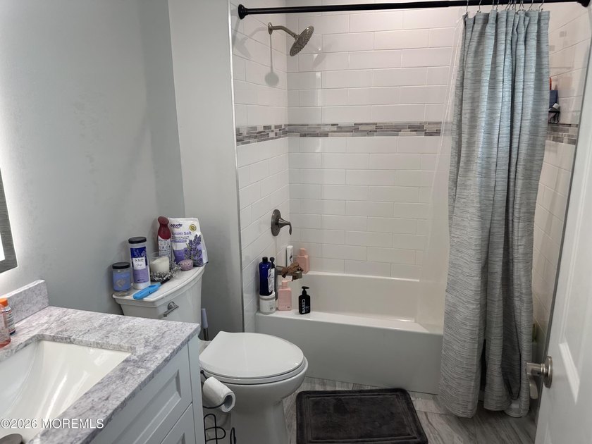 Totally renovated 2023. Open kitchen/living room floor plan with - photo 15