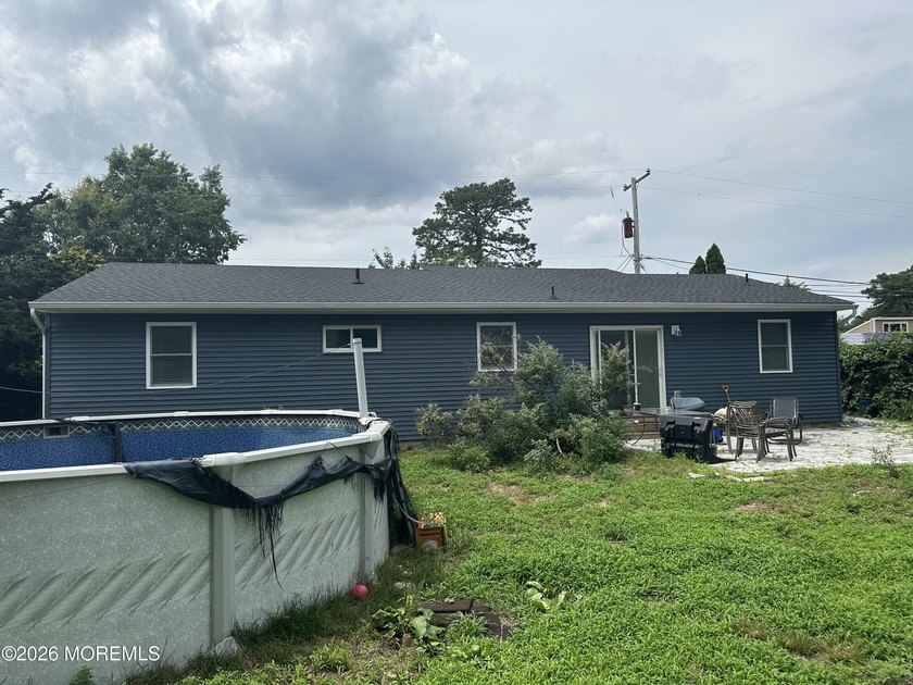 Totally renovated 2023. Open kitchen/living room floor plan with - photo 17