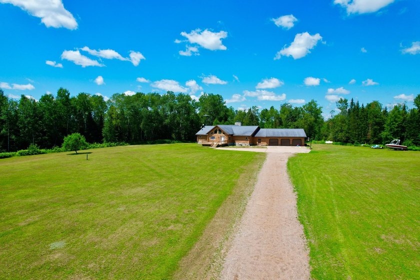 Your Northwoods dream home awaits! Nestled on 14.68 acres, this - photo 5