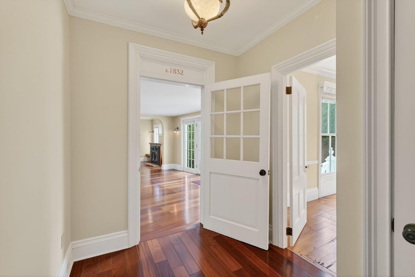 This beautiful 3,238 square foot c. 1832 Italianate sits in the - photo 12