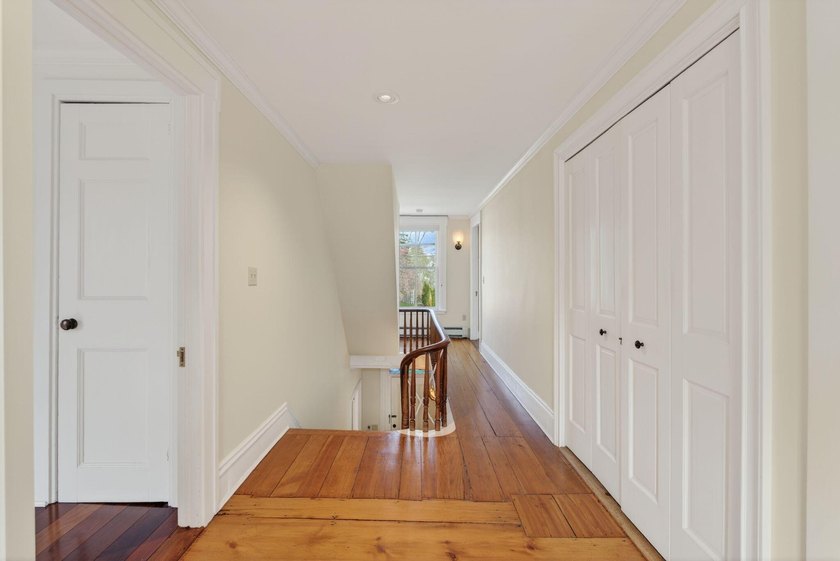 This beautiful 3,238 square foot c. 1832 Italianate sits in the - photo 24