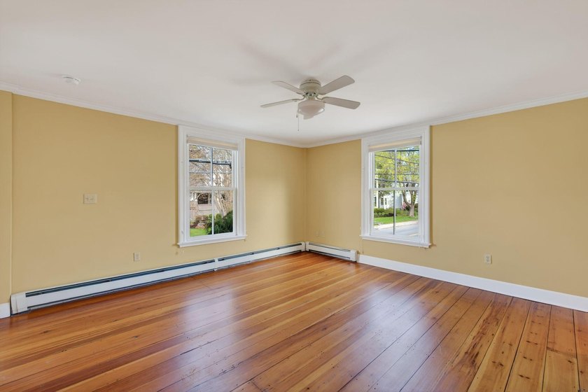 This beautiful 3,238 square foot c. 1832 Italianate sits in the - photo 32