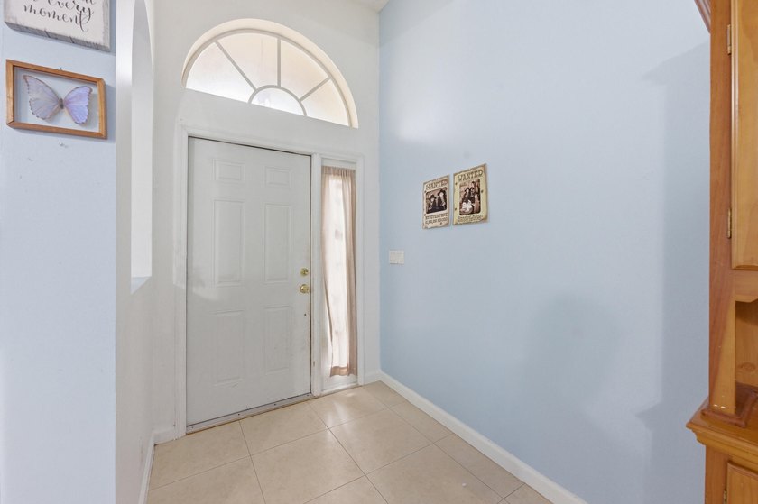 Spacious home with high ceilings and a bright, open layout. The - photo 3