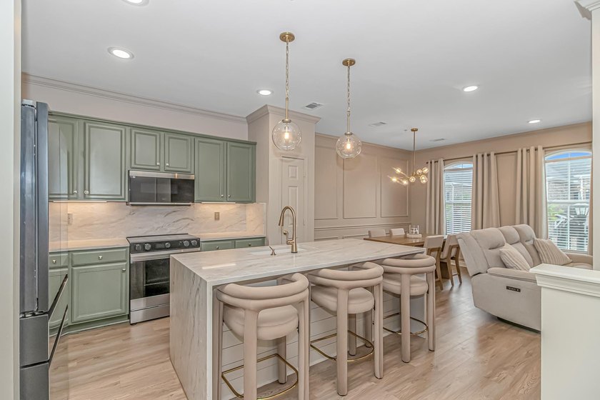 Welcome to this exceptional 3-bedroom, 4-bath mixed-use townhome - photo 8